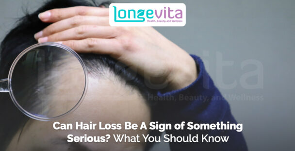 person holding magnifying glass over thinning hairline with text about serious hair loss