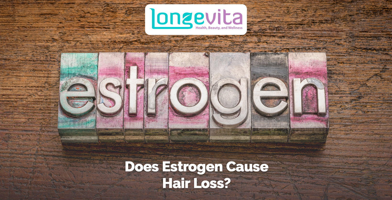 word estrogen printed in block letters on wooden background