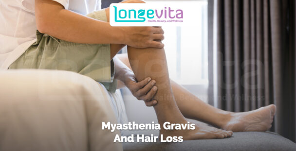 person holding their leg in discomfort while sitting indoors