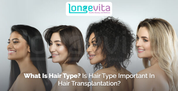 four women with different hair types from straight to curly smiling in profile