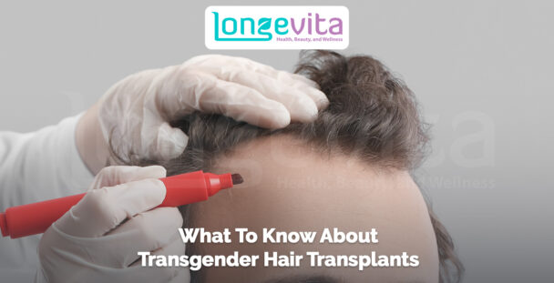 doctor marking hairline with red marker before transgender hair transplant