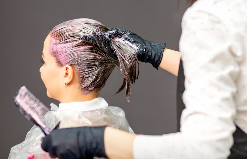 Woman dyeing hair