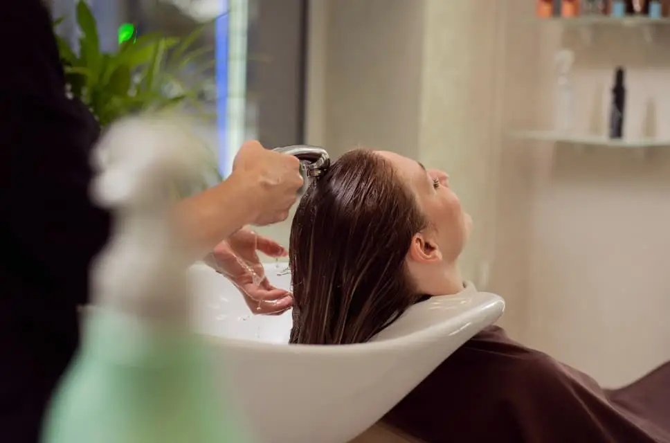 woman getting hair treatment