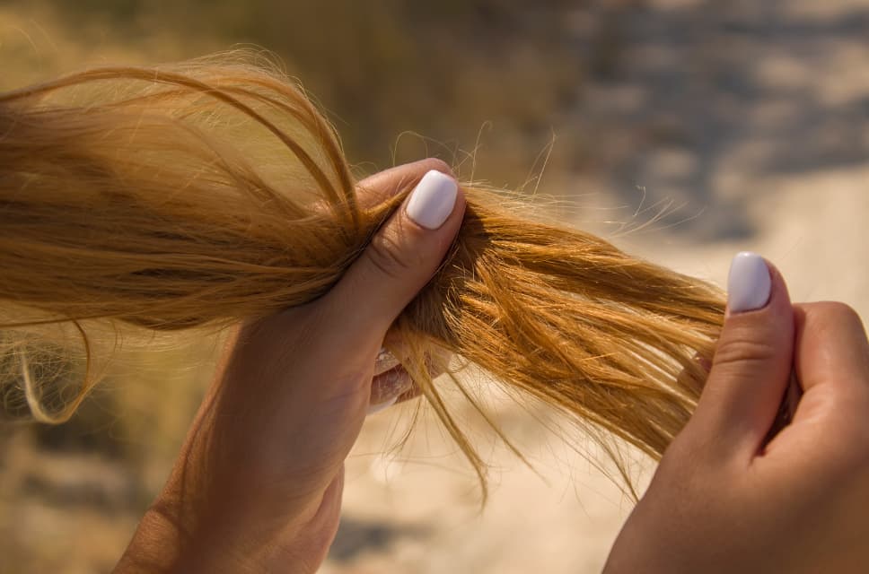 woman holding hair