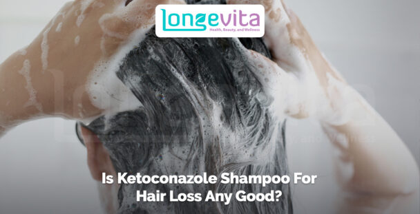 person lathering shampoo into scalp with text about ketoconazole for hair loss