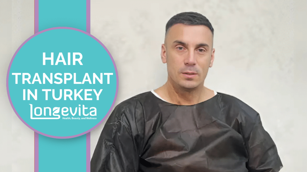 man sitting upright in clinic after hair transplant in Turkey